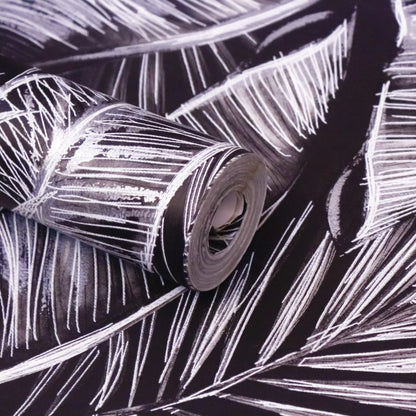 Roll of silver metallic tape on a black background with white lines.