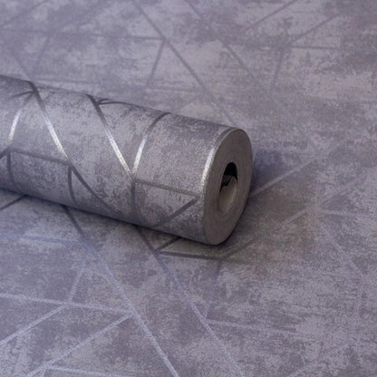 Roll of gray textured wallpaper on a matching background