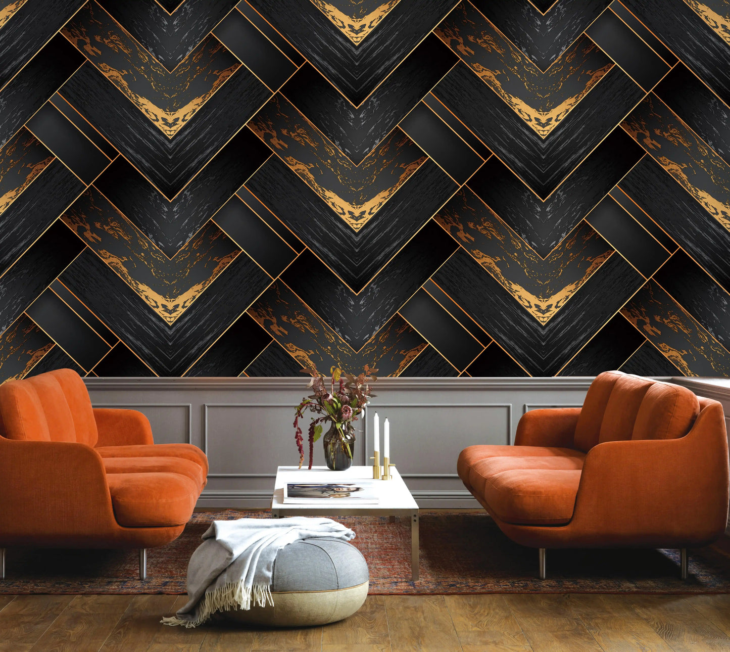 Modern living room with orange chairs and a decorative wall.