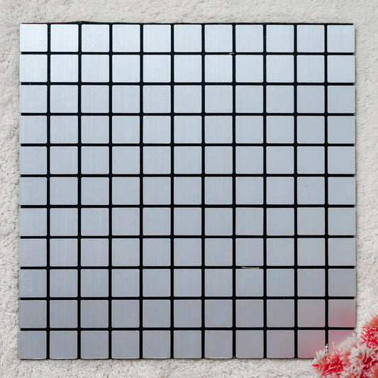 Square tile with a grid pattern on a textured surface