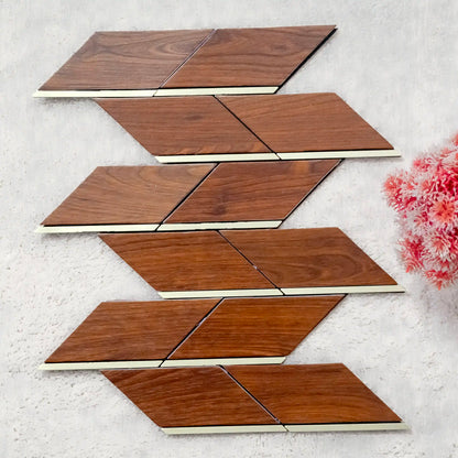 Wooden tiles arranged in a geometric pattern on a textured surface with flowers.