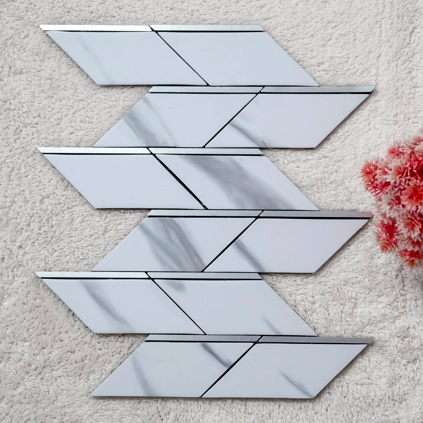 Set of geometrically shaped mirrors on a textured surface