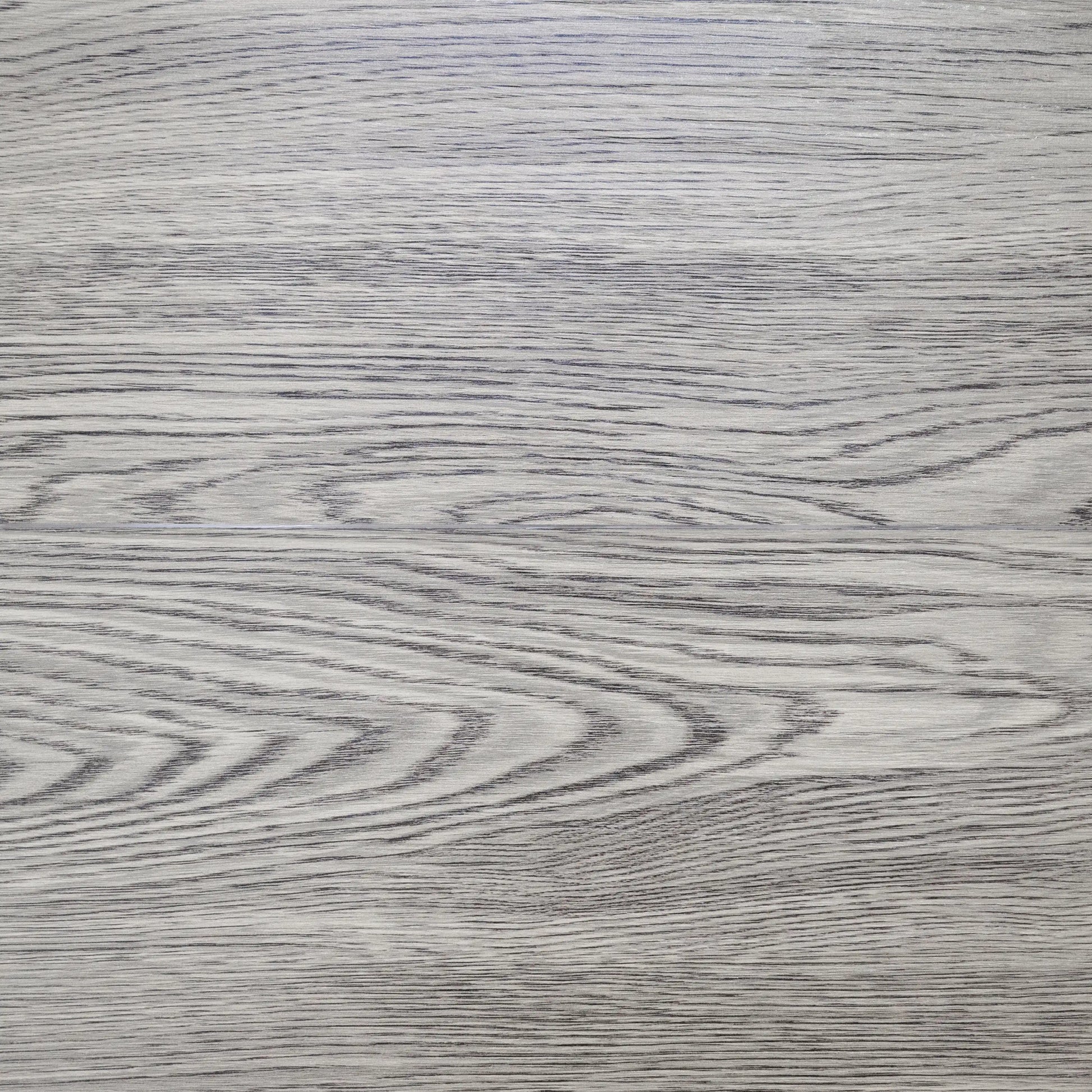 Close-up of a gray wooden surface with visible grain patterns