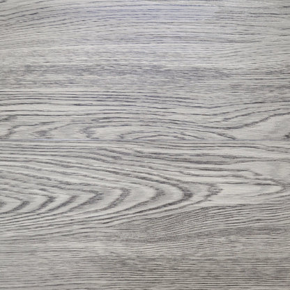 Close-up of a gray wooden surface with visible grain patterns