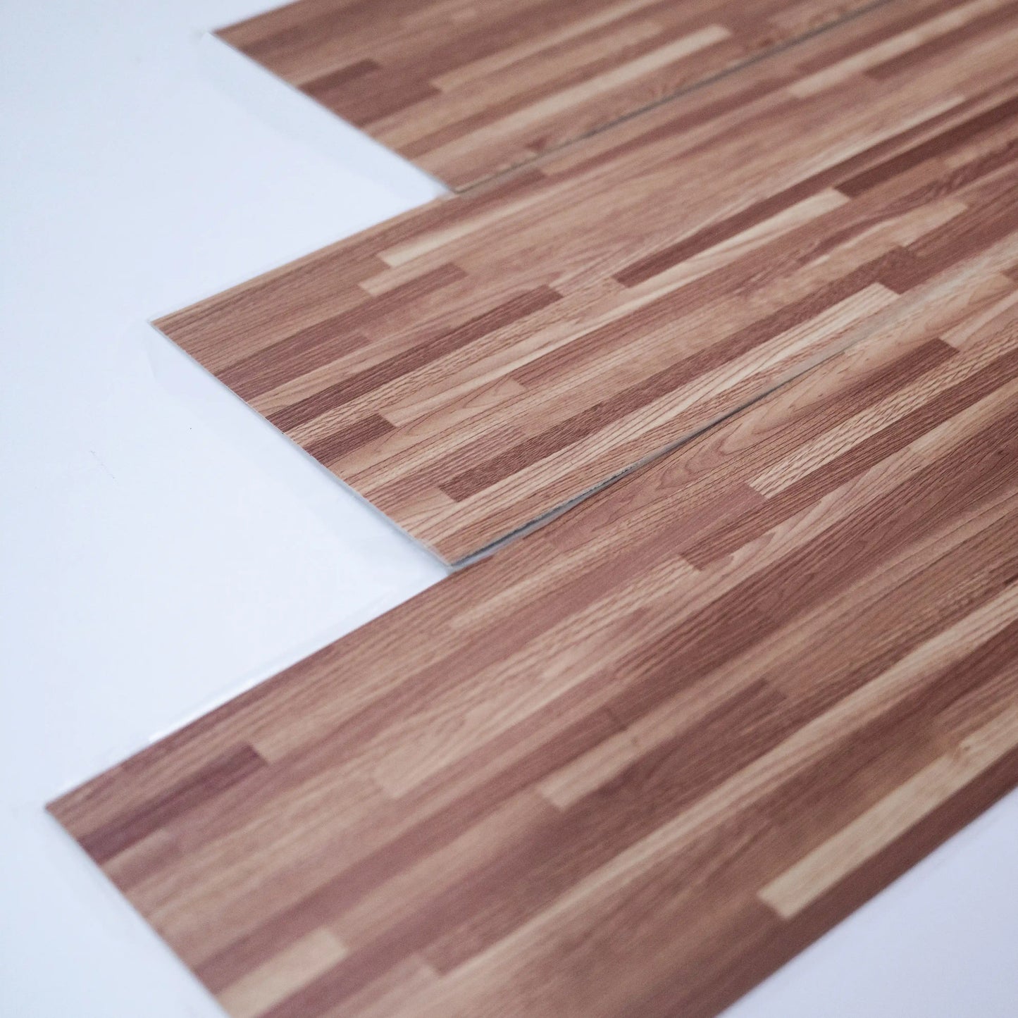 Wooden flooring panels on a white background