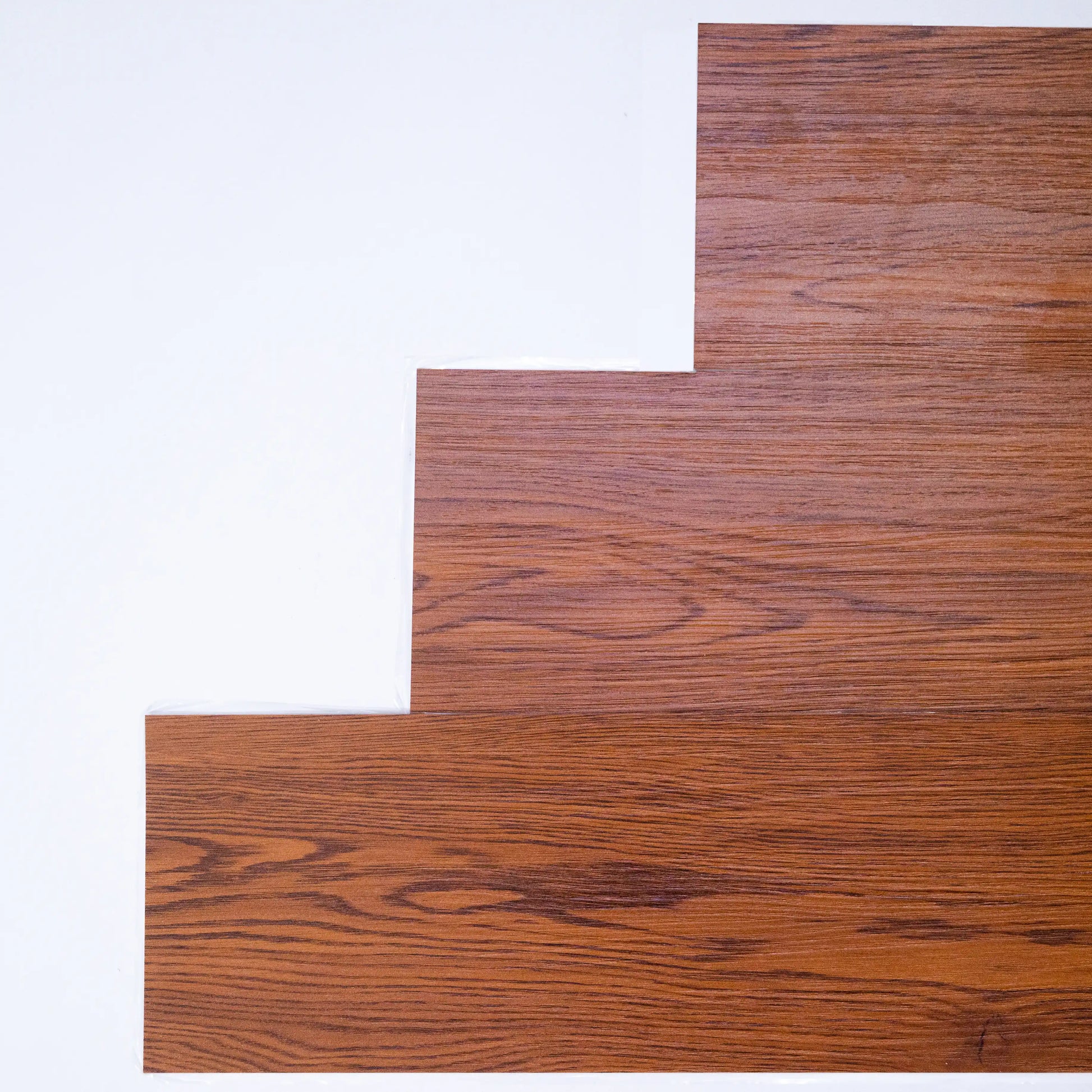 Wooden flooring panels on a white background