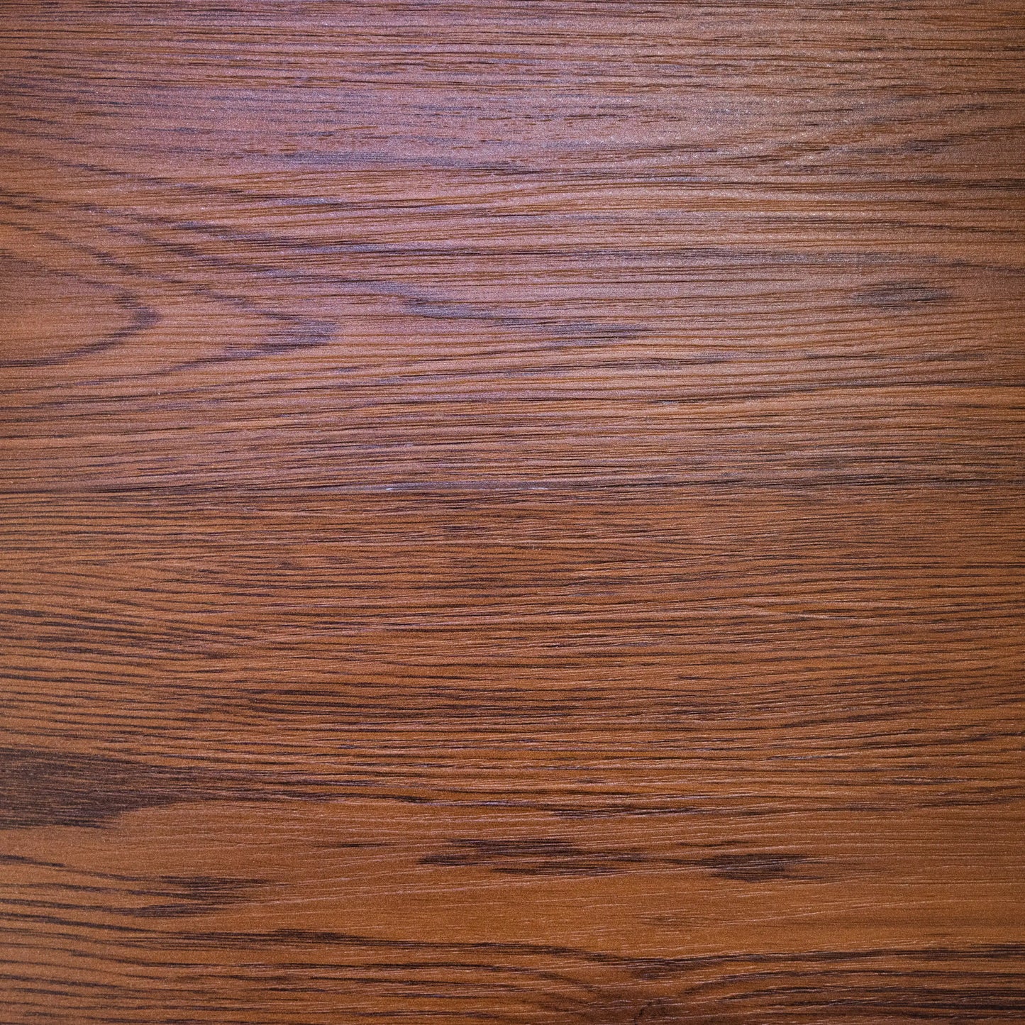 Close-up of a wooden surface with visible grain and texture