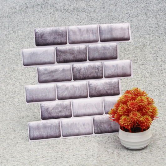 Decorative wall stickers resembling bricks on a textured wall with a potted plant.