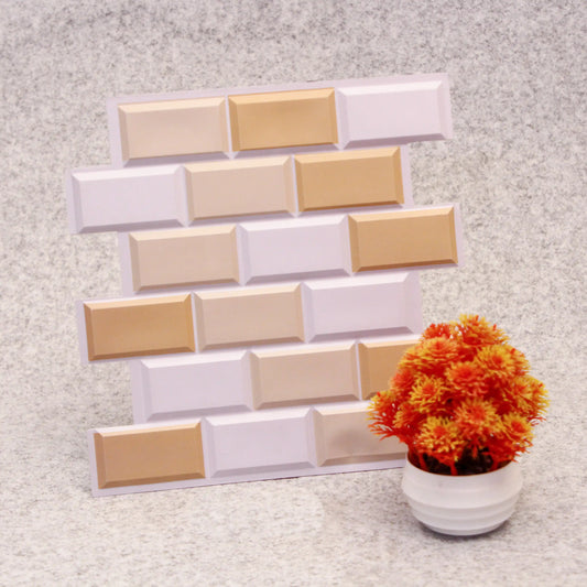 Decorative wall tiles in beige and white with a potted plant on a textured surface