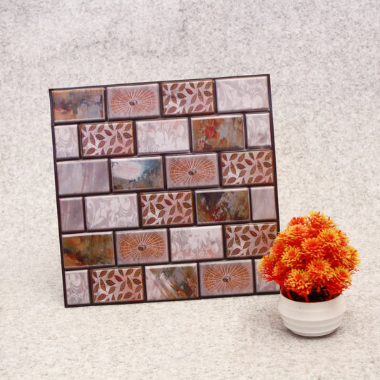 Decorative wall art with patterned tiles and a potted plant on a textured surface