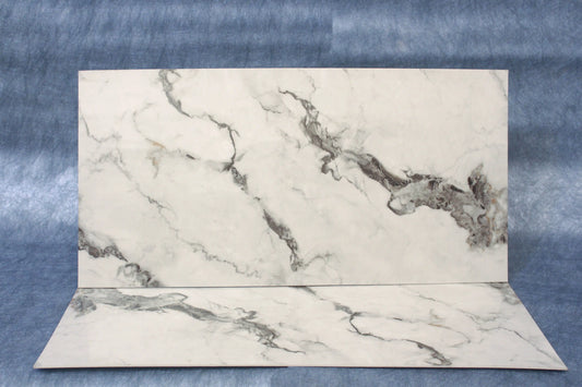 Marble-patterned paper on a textured blue background