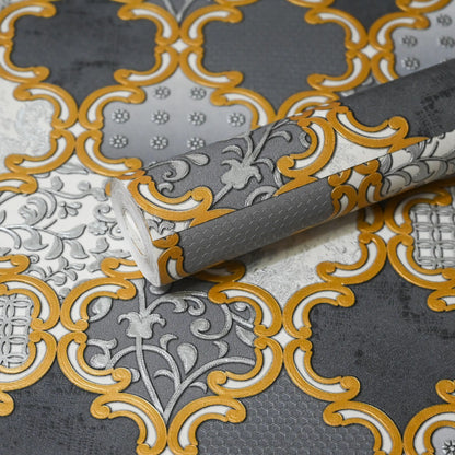 Decorative wallpaper with gold and gray pattern on a textured surface