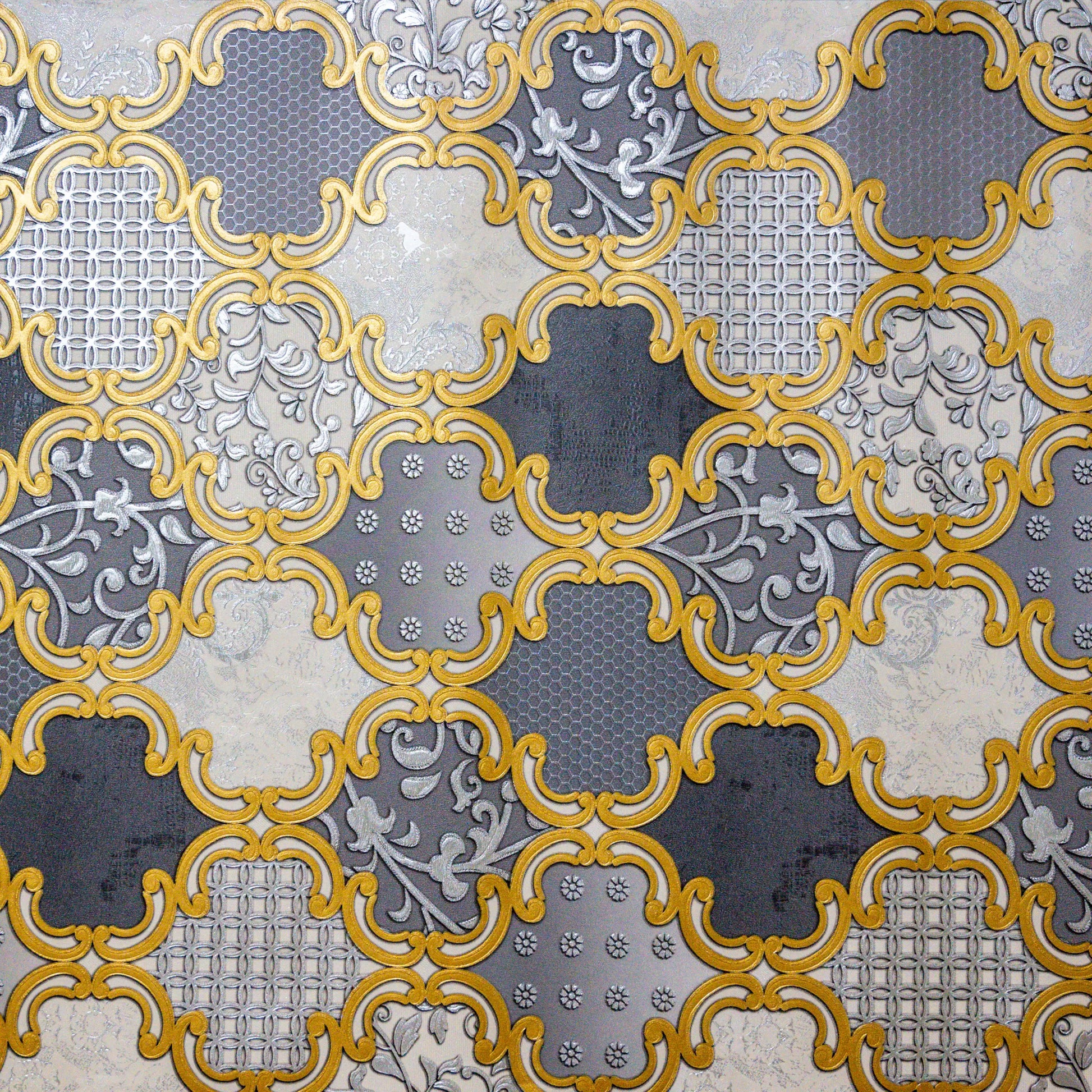 Decorative tiles with intricate patterns in gray, yellow, and white.