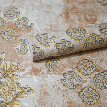 Roll of decorative wallpaper with intricate patterns on a textured surface