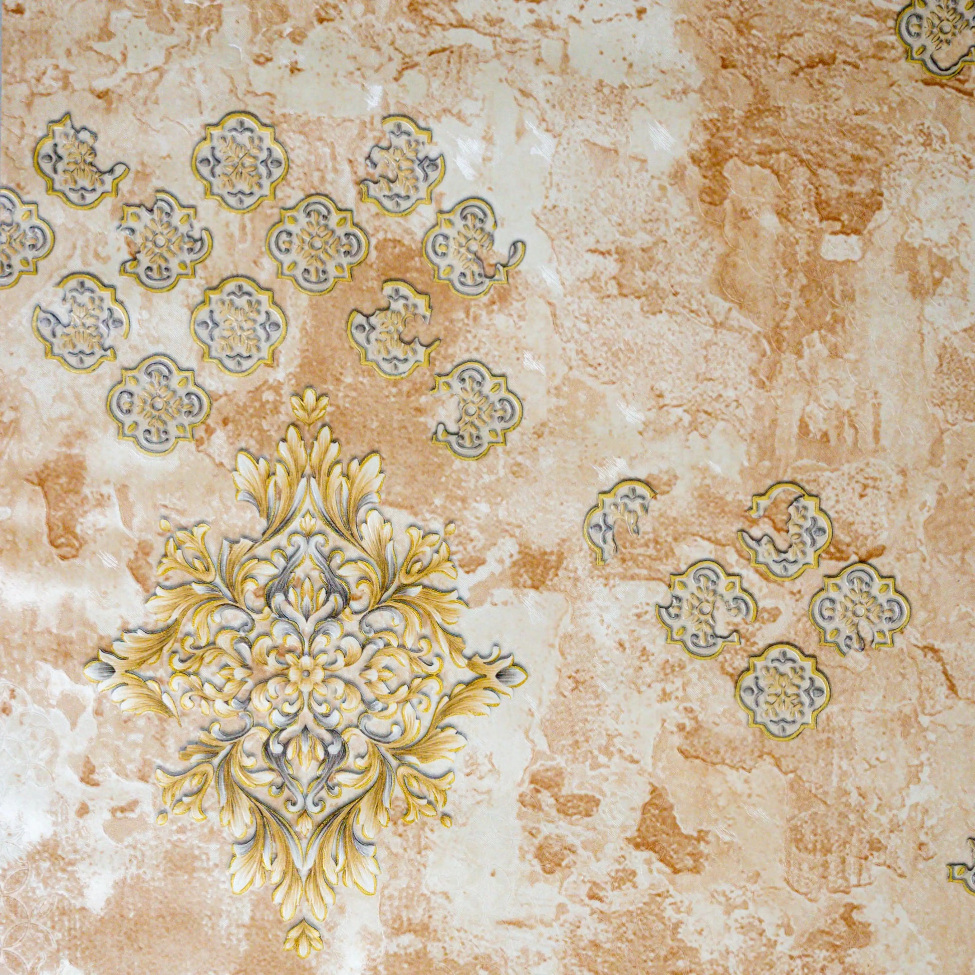 Decorative tile with floral patterns on a textured beige background