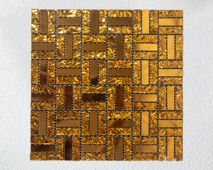 Gold and bronze mosaic tile pattern on a white background