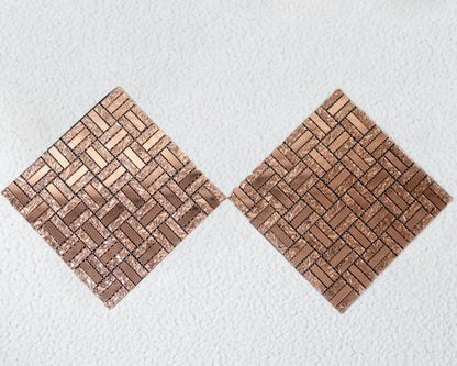 Two woven wooden coasters on a textured white surface