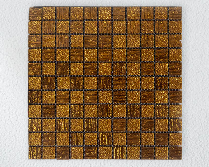 Square tile with gold and bronze mosaic pattern on a white background