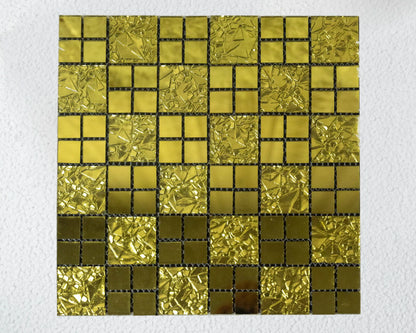 Gold mosaic tile pattern on a white background
