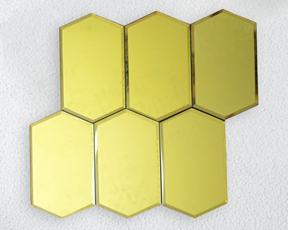 Hexagonal gold tiles on a white background