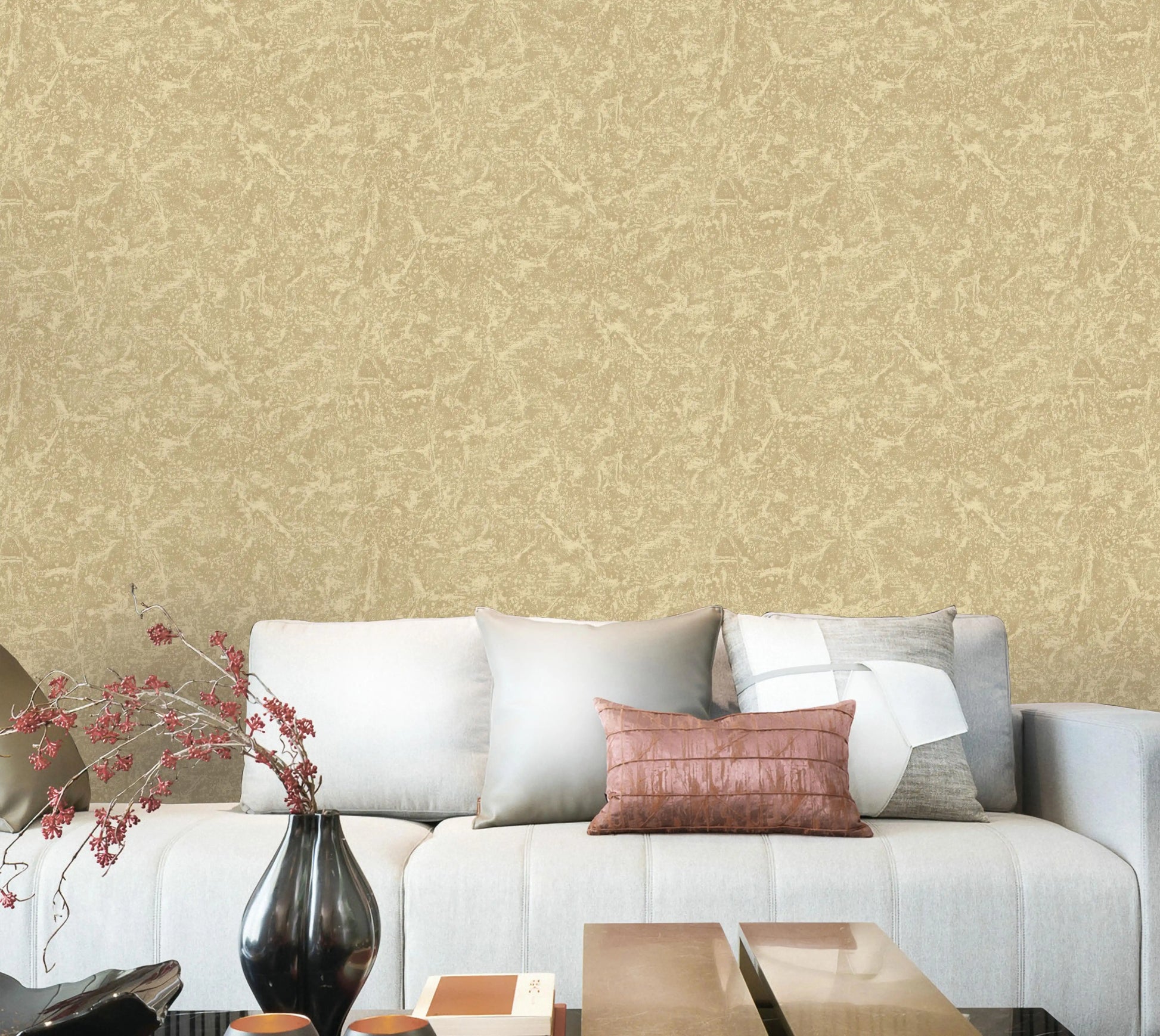 Living room with a beige patterned wall, white sofa, and decorative elements.